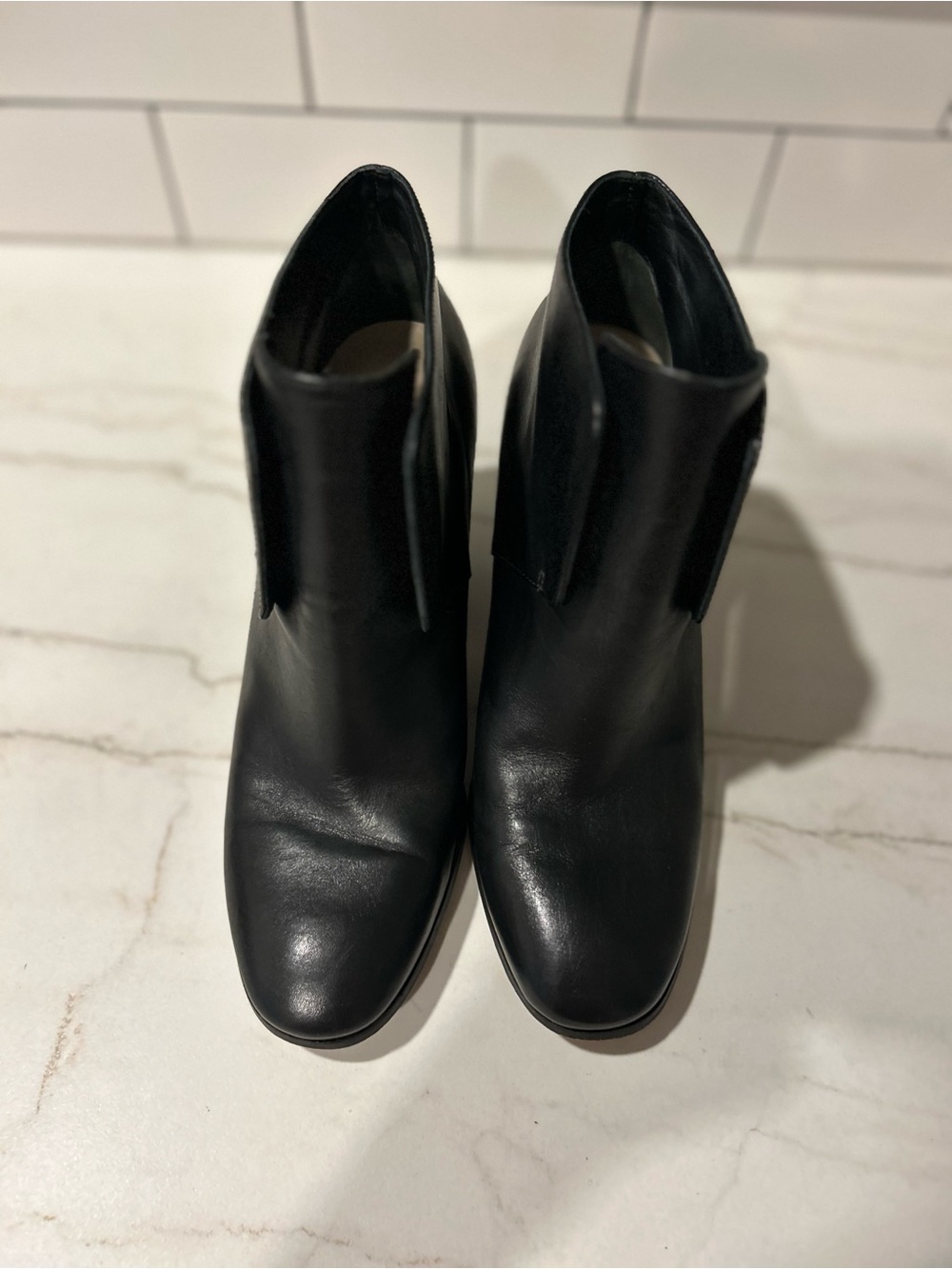 Cole Haan Black Leather Fold-Over Ankle Booties with Gold Hardware Heel Accent